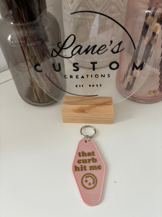 That curb hit me Motel Keyring