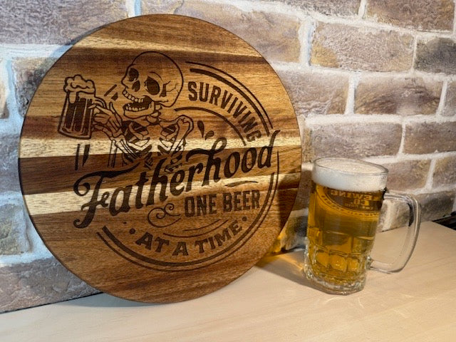 Engraved Acacia Wooden Board/Sign – “Surviving Fatherhood One Beer at a Time”