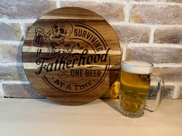 Engraved Acacia Wooden Board/Sign – “Surviving Fatherhood One Beer at a Time”
